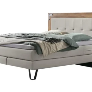 Hasena Boxspringbett OAKLAND mit Wildeiche-Rahmen, grauem Stoff und gepolstertem Kopfteil, Gesamtansicht.
