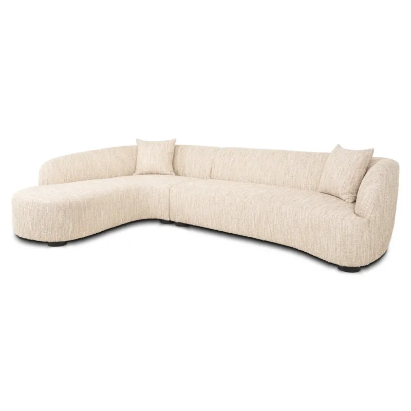 Sofa Pandora Lounge Left in Beige Angora mit geschwungener Form und abgerundeten Armlehnen in Gesamtansicht von schräg vorne.