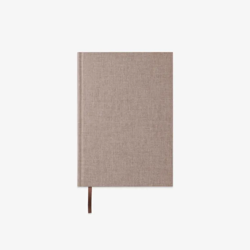 Beige fabric-bound notebook